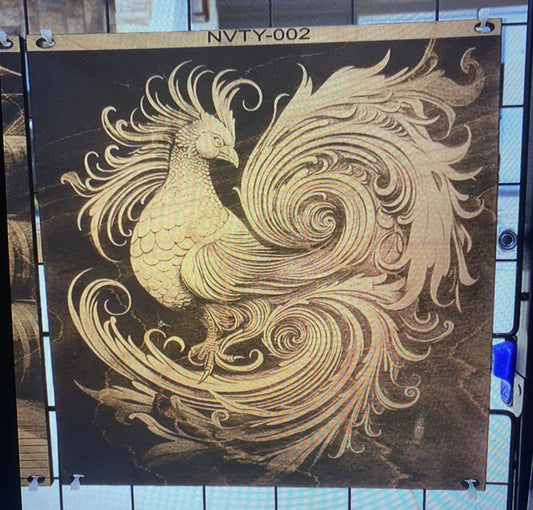“Feathers of Flame – The Ornamental Phoenix” SKU: NVTY-002